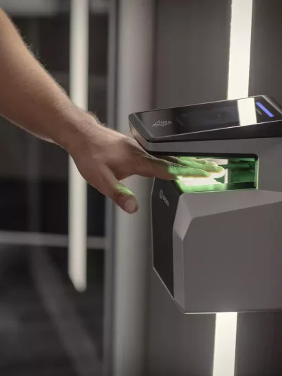 Hand scanning a biometric commercial access control card reader